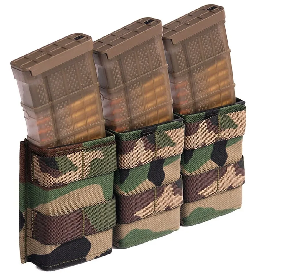 Three loaded rifle magazines fit securely in Esstac KYWI 5.56 Triple Shorty camo pouches, aligned side by side.