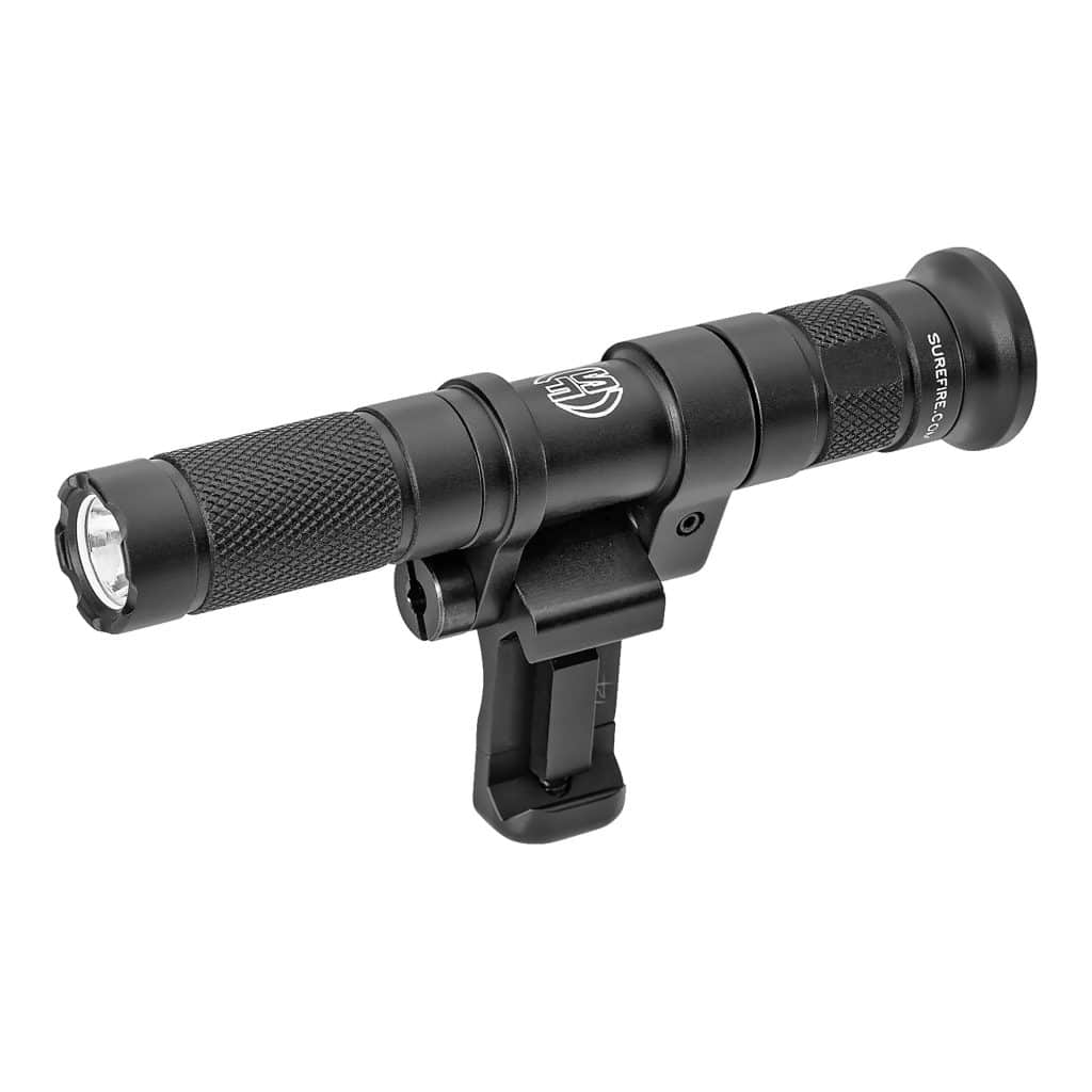 Surefire M140A Micro Scout Pro Blk Surefire M140A Micro Scout Pro Blk: Black tactical flashlight with mount, textured grip, and small logo near the lens. Ideal for equipment attachment.